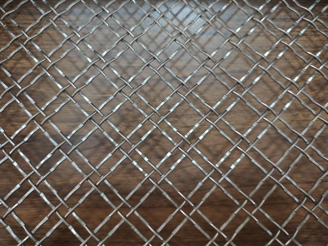 金屬編織藝術(shù) 不銹鋼屏風(fēng)、幕墻、吊頂與隔斷的多樣裝飾應(yīng)用